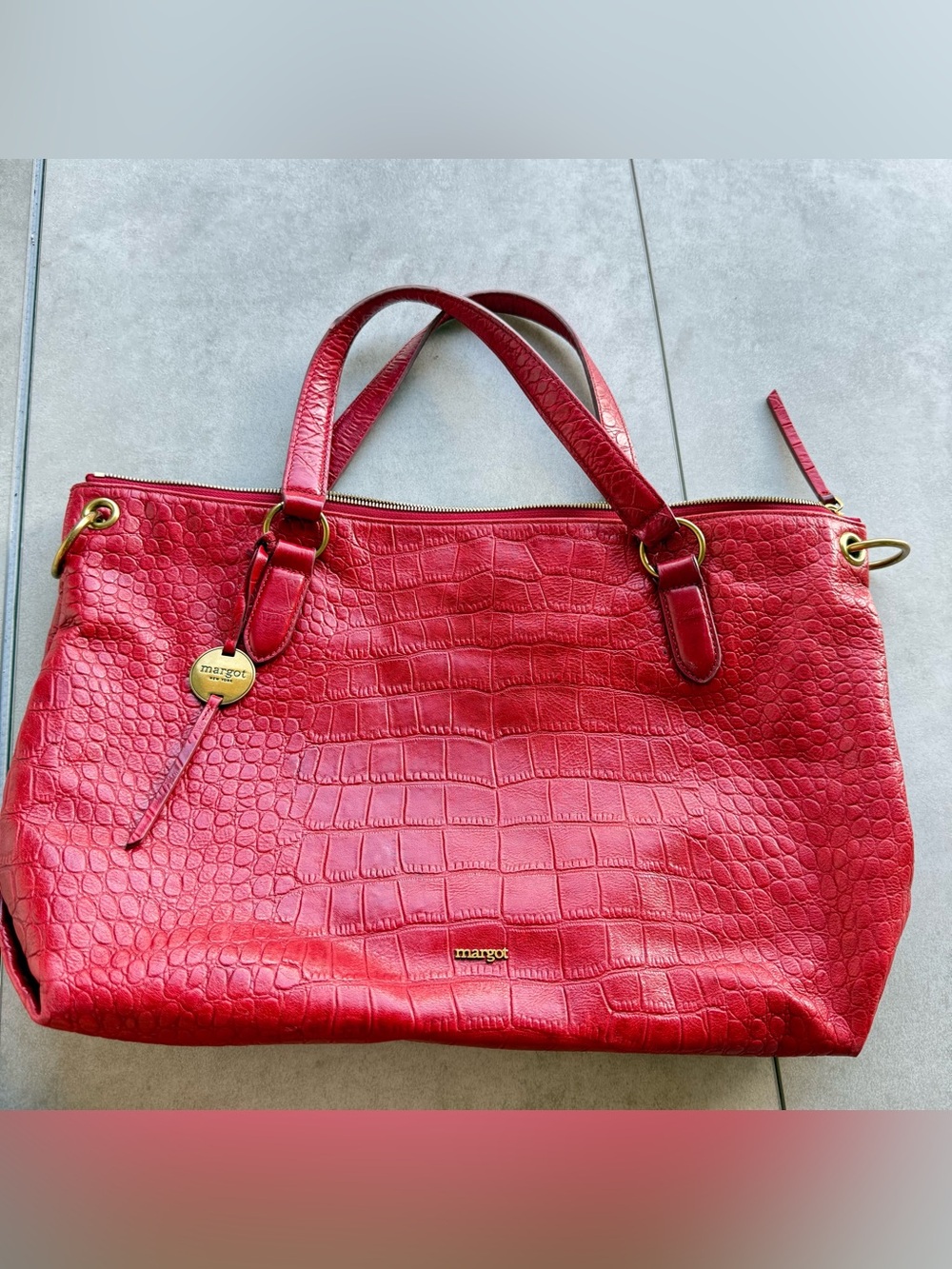 Margot Tote Bag Red medium
Alligator leather full zip Gold logo pockets lined